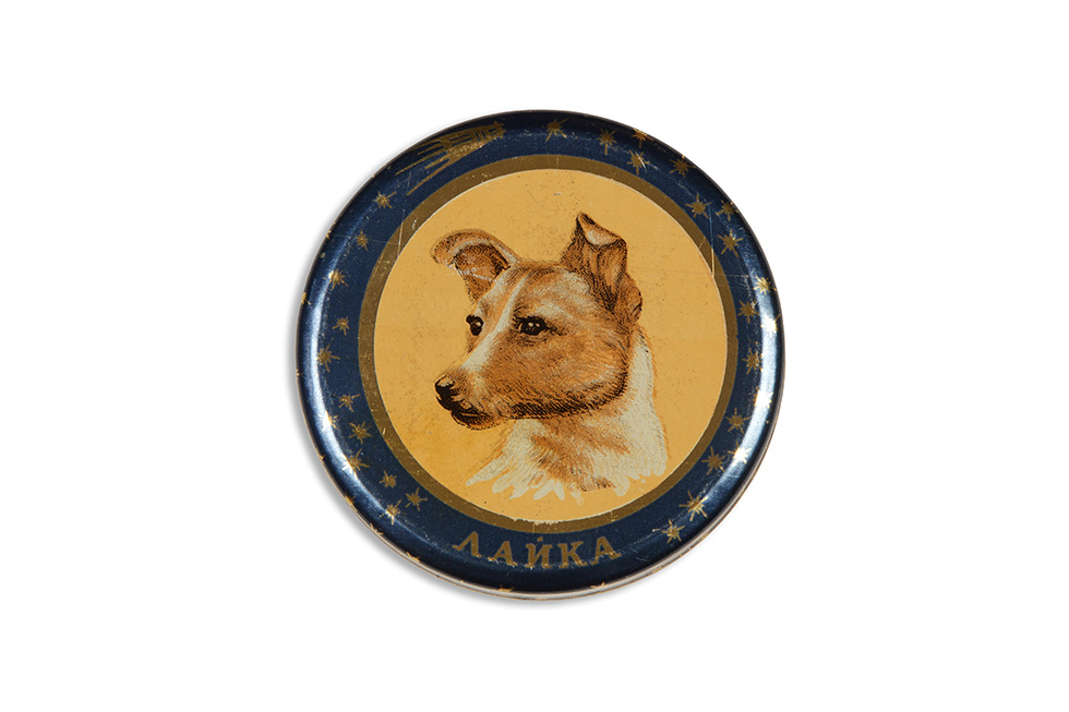 MARTIN PARR COLLECTION. Soviet Space dog ephemera. Laika. Tobacco tin. 2014.